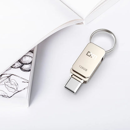 Silver BackupMyFilesNow 32GB USB-C OTG USB 3.0 flash drive with compact design for smartphones and data transfer.