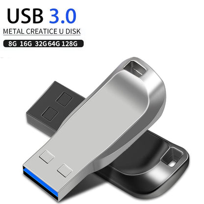 Silver and black metal U disk by BackupMyFilesNow.com, 32GB USB flash drive for easy file storage and transfer.
