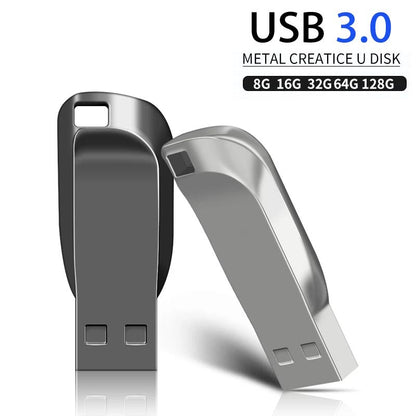 Silver and black metal U Disk by BackupMyFilesNow.com, 32GB USB flash drive for convenient file storage.
