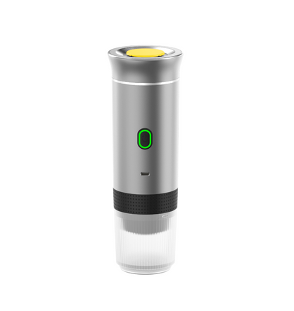 Silver BACKUPMYFILESNOW.COM® portable coffee machine with compact design for easy brewing on the go.