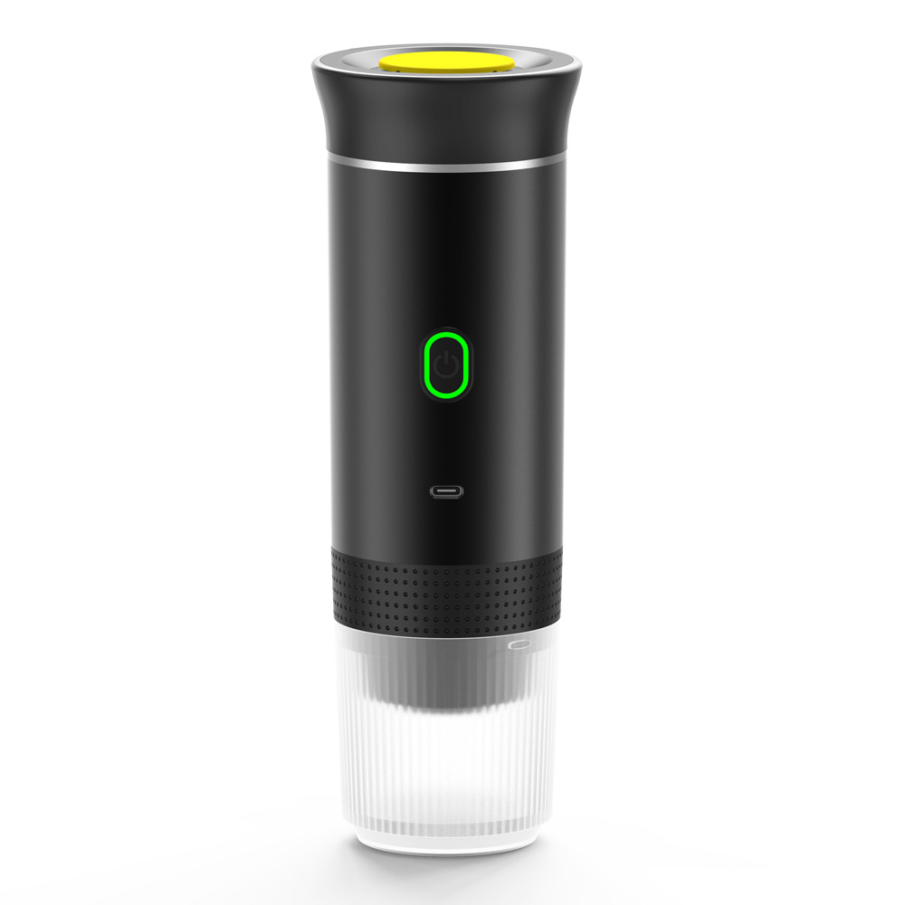 Silver portable coffee machine by BACKUPMYFILESNOW.COM® with compact design and brewing components visible.