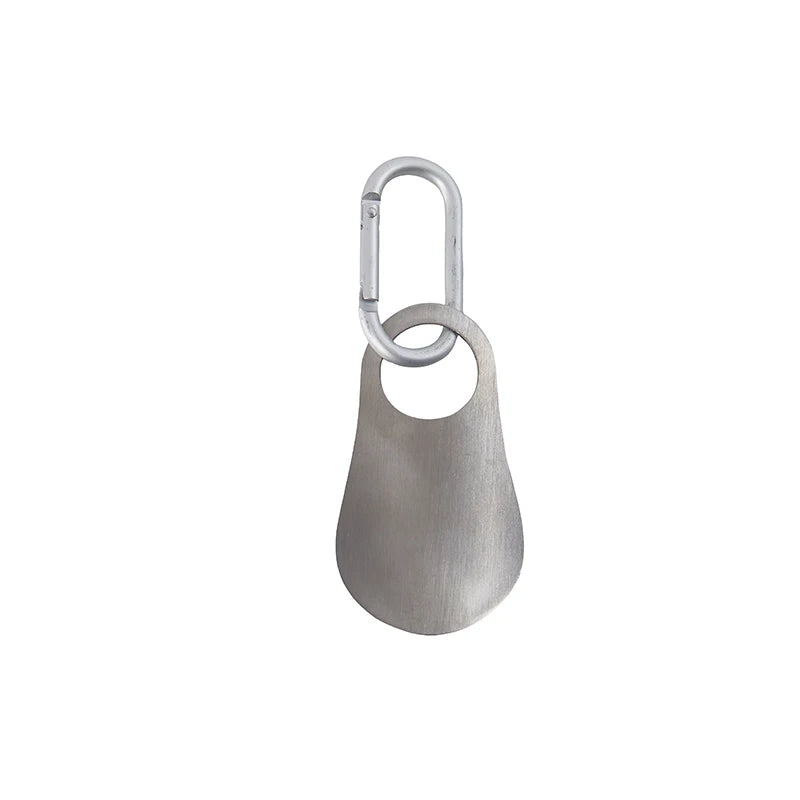 Stainless steel 7.5cm shoehorn with carabiner, compact shoe lifting tool, designed for easy slipping into shoes and storage.