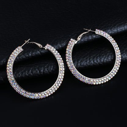Luxury round crystal hoop earrings for women with sparkling crystal accents, crafted by BACKUPMYFILESNOW.COM®.