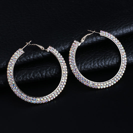Luxury round crystal hoop earrings for women with sparkling crystal accents, crafted by BACKUPMYFILESNOW.COM®.