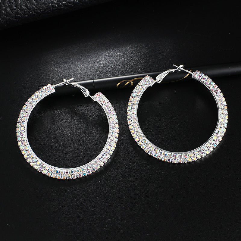 Luxury round crystal hoop earrings for women by BACKUPMYFILESNOW.COM®, featuring sparkling crystal embellishments and polished metal finish.