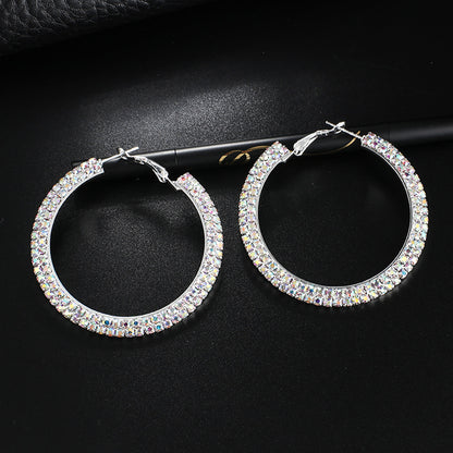 Luxury round crystal hoop earrings for women by BACKUPMYFILESNOW.COM®, featuring sparkling crystal embellishments and polished metal finish.