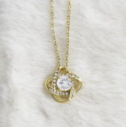 Four-leaf clover eternal love pendant from BACKUPMYFILESNOW.COM®, featuring a detailed silver charm with a four-leaf clover design.