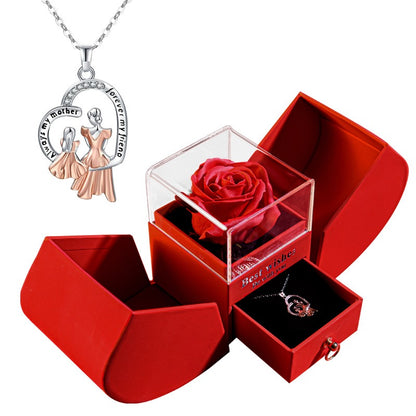 Silver heart necklace in a Christmas gift box set by BACKUPMYFILESNOW.COM®, perfect for holiday gift-giving.