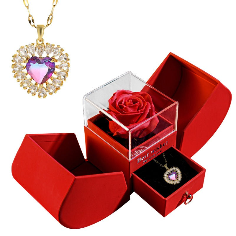 Silver heart-shaped mom necklace in a Christmas gift box set from BACKUPMYFILESNOW.COM® with festive holiday design.