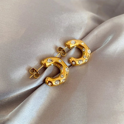 Gold plated stainless steel earrings for women with irregular pearls and zircon stones, featuring a chunky, statement design.