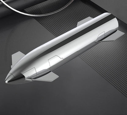 SpaceX Starship rocket model with metallic texture, NASA-themed desktop ornament, featuring Dragon spacecraft and Falcon rocket details.