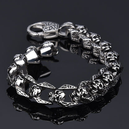 Stainless steel punk skull bracelet with bold design, featuring engraved skull motifs, by BACKUPMYFILESNOW.COM®.