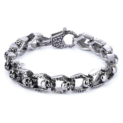 Stainless steel punk skull bracelet with edgy design, featuring skull motifs and bold metal links.