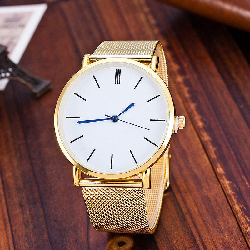 Silver quartz business watch with a sleek design, featuring a round dial and metal strap, by BackupMyFilesNow.com.