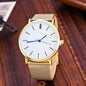Silver quartz business watch with a sleek design, featuring a round dial and metal strap, by BackupMyFilesNow.com.