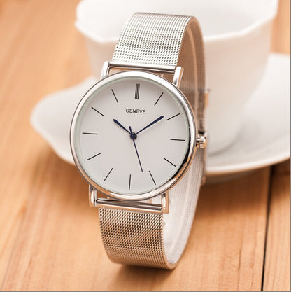 Silver Quartz Business Watch with a round dial and metal strap, stylish accessory for professional attire.