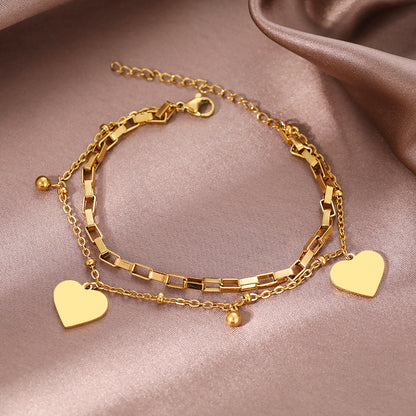 Couple's bracelet with double heart vintage design, featuring intricate metalwork and romantic style, perfect for couples.