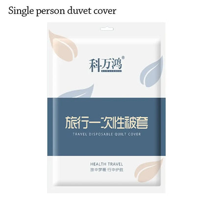 Disposable bed sheet set with duvet cover and pillowcase, non-woven isolation sheets, ideal for travel and hygienic bedding.