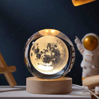 3D crystal ball night light featuring glowing galaxy design with Saturn, planets, and moon, perfect as a children’s bedside lamp.