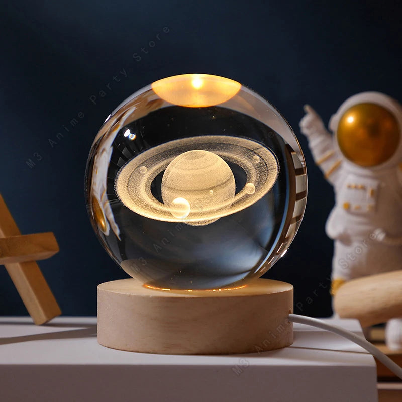 3D crystal ball night light LED lamp featuring glowing galaxy with Saturn, planets, and moon, perfect as a children's birthday gift.