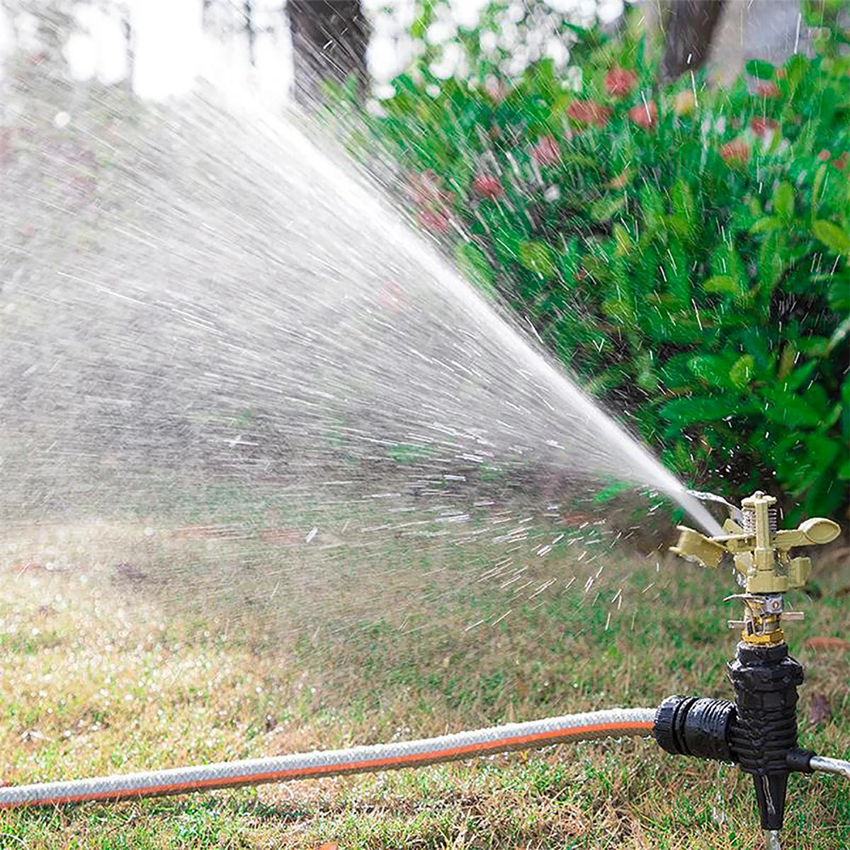 Garden rotating rocker impact sprinkler with adjustable brass nozzle and 1/2" male thread for lawn watering and irrigation.
