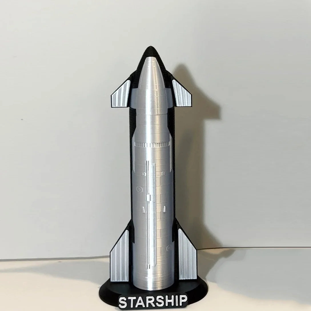 3D printed S24 Musk SpaceX Starship rocket model by BACKUPMYFILESNOW.COM, detailed NASA-style finished product.