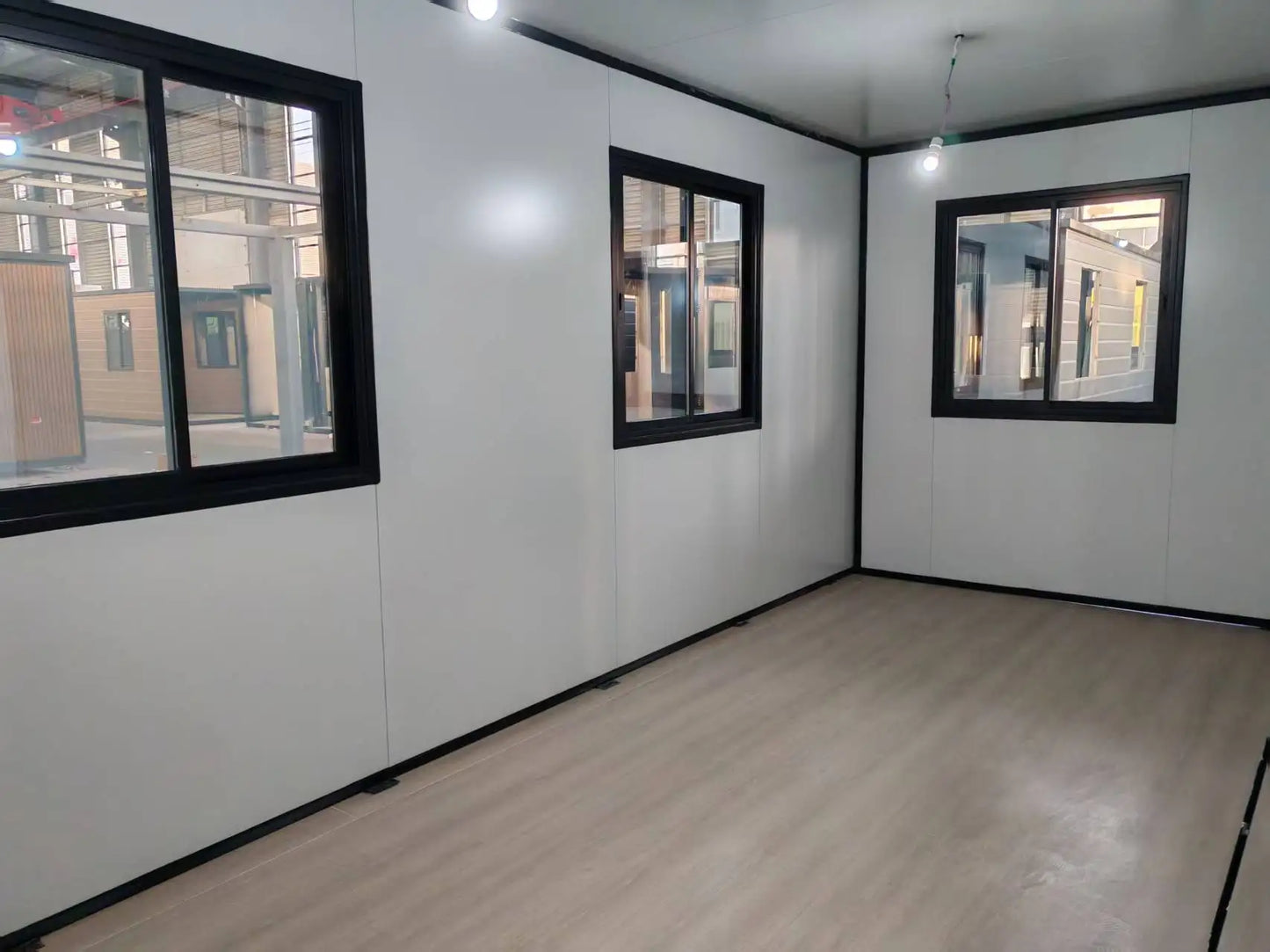 Modern steel prefab container house with 2-3 bedrooms, living room, and office space by BACKUPMYFILESNOW.COM®.