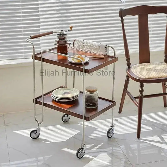 Medical salon trolley with rolling wheels, multiple shelves, and a compact design for salon and workshop use.