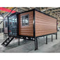 Modern 20ft and 40ft expandable container house by BACKUPMYFILESNOW.COM, featuring sleek design for tiny home or forest cabin use.