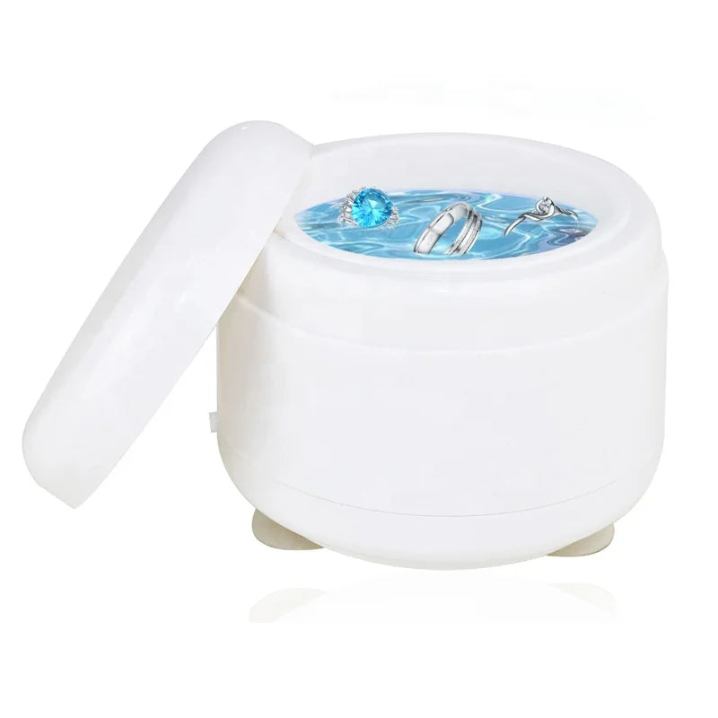 Professional portable jewelry cleaning machine with digital controls, suitable for rings, watches, coins, earrings, and small metal parts.
