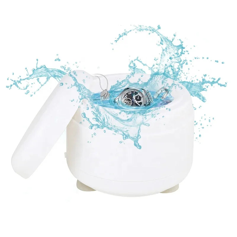 Portable jewelry cleaning machine by BackupMyFilesNow.com, cleaning rings, watches, coins, earrings, and small metal parts.