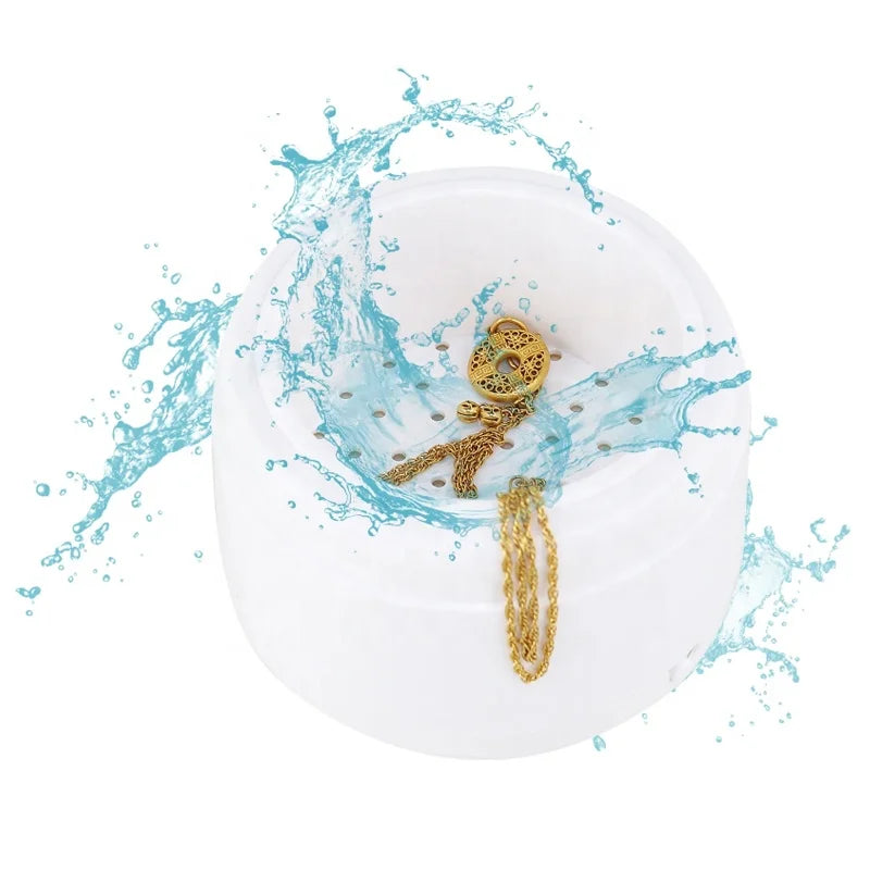 Portable jewelry cleaning machine by BackupMyFilesNow.com for rings, watches, coins, earrings, necklaces, dentures, and small metal parts.