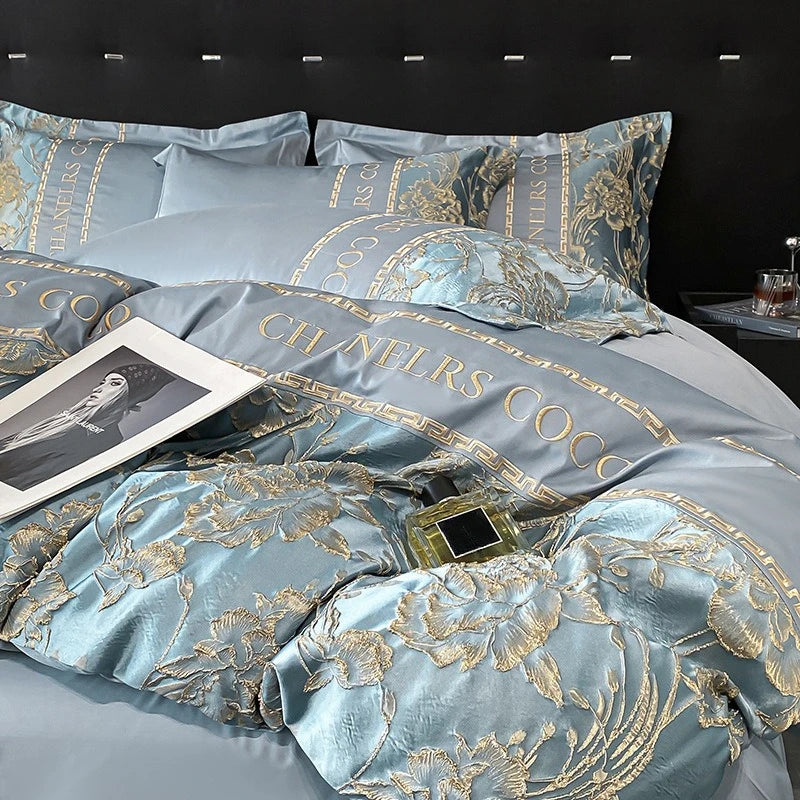 Luxury European cotton bedding set with embroidered quilt cover, sheets, and hats, featuring high-end design and elegant details.