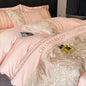 High-end European luxury cotton bedding set with embroidered quilt cover, sheets, and matching hats, designed for senior comfort.
