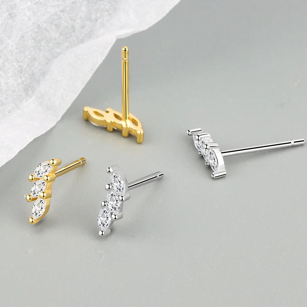 Set of three stainless steel zircon huggie hoop earrings for women, featuring elegant, small cartilage piercing jewelry.