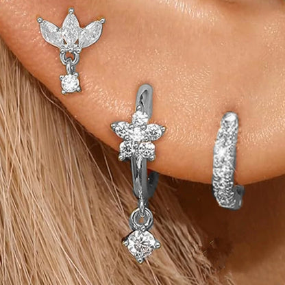Set of three stainless steel zircon huggie hoop earrings for women, featuring small, elegant cartilage piercing jewelry.