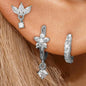 Set of three stainless steel zircon huggie hoop earrings for women, featuring small, elegant cartilage piercing jewelry.