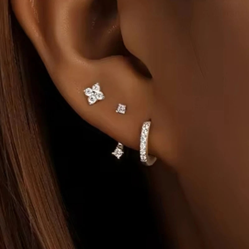 Three pairs of zircon hoop earrings for women, stainless steel cartilage earrings, featuring delicate, shiny designs for piercing jewelry.