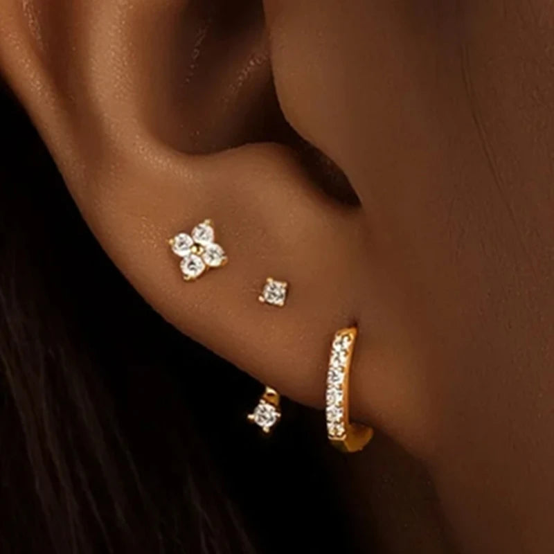 Set of three stainless steel zircon hoop earrings for women, featuring small huggies and cartilage earrings for piercing jewelry.