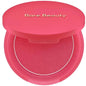 Rare Beauty Soft Pinch Matte Bouncy Cream-to-Powder Blush in airy, lightweight liquid form, natural makeup look on model's cheek.