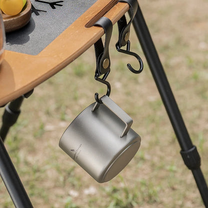 Titanium double-wall mini camping mug with handle, 220ml capacity, lightweight outdoor tableware, ideal for coffee or drinks.