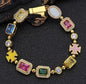 Gold-plated hip-hop gemstone necklace with a 16-inch titanium chain, showcasing vibrant gemstones and stylish design.