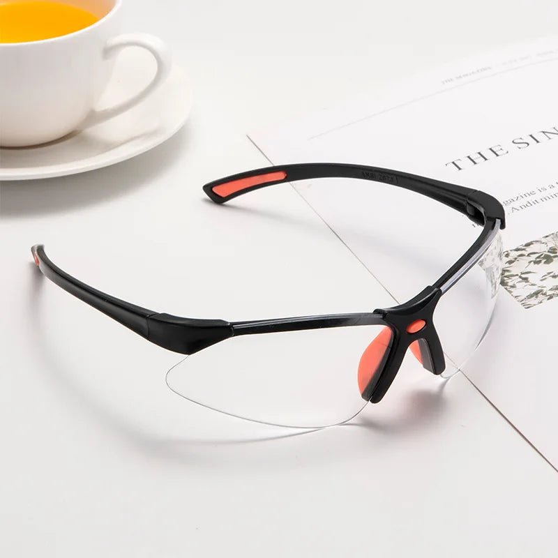 Transparent safety goggles from BACKUPMYFILESNOW.COM® designed for cycling, lab work, and protection with secure, clear protective lenses.