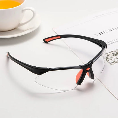 Transparent safety goggles for cycling and lab work, providing protective security and clear vision during work or biking activities.