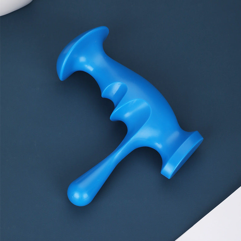 Green manual trigger point massager from BACKUPMYFILESNOW.COM® for targeted muscle relief and tension release.