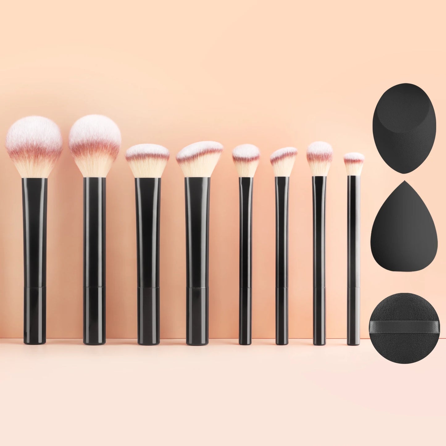Black long tube face and eye brush set with 8 brushes, 2 beauty sponges, and 1 puff for powder, blush, and eyeshadow applications.
