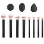 Black long tube face and eye brush set with 2 beauty sponges, powder, blush, and eyeshadow brushes for makeup application.