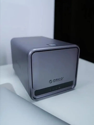 Orico TS200 USB 3.2 MetaCube NAS enclosure with 2.5 bays for HDD/SSD, supporting up to 100TB for personal cloud storage.