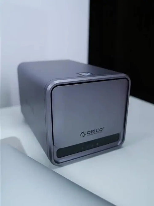 Orico TS200 USB 3.2 MetaCube NAS enclosure with 2.5 bays for HDD/SSD, supporting up to 100TB for personal cloud storage.