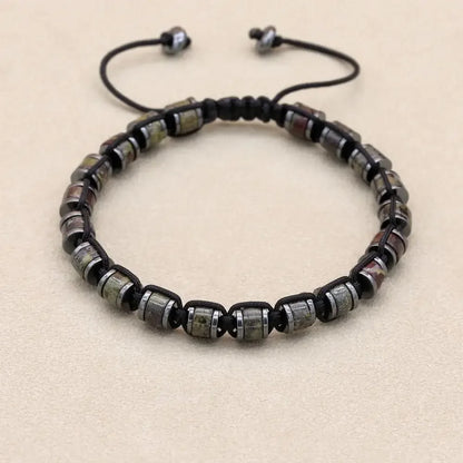 Natural stone hematite and dragon blood beads braided men's bracelet, handmade jewelry for women and couples, health-focused design.
